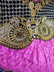 A Braco Net Gown It Comes With Yellow Duppatta
