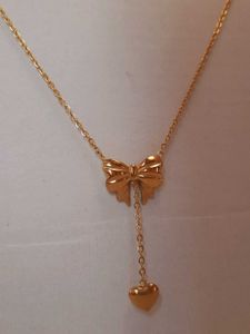 Anti Tarnish Heart Themed Bow Inspired Pendant
