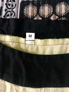 Beautiful Seleveless Top In Yellow Black Colour