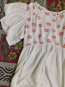 Daisy Embroidered Peplum Top