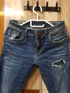 Ripped Blue Denim Jeans