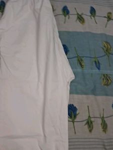 White Straight Pant With Embroidery Work At Bottom
