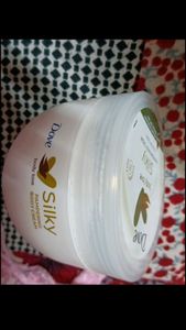 it is a moisturizer, new, unused, dove silky pampering cream body love