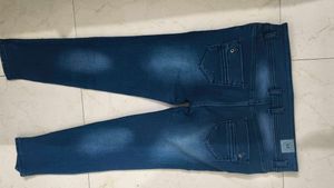 Ripped Blue Denim Jeans