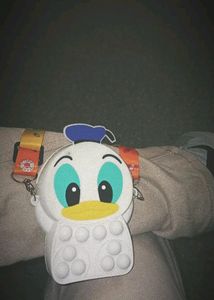 ⊹ ࣪Donald Duck Pop-it Bagּ ֶָ֢.