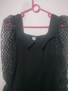WomenMid Length Frock With Netted Puff Hand Sleeve