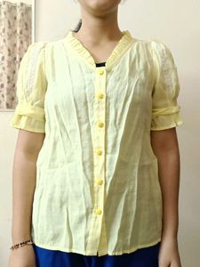 women yellow top