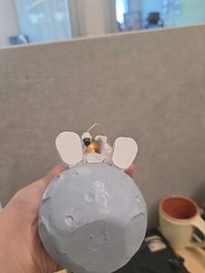 Astronaut Fishing on the Moon Figurine