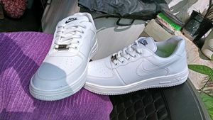 Nike Air Force 1 - Classic White Sneakers