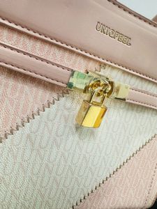 Blush Pink Structured Handbag with Gold Lock