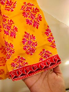 A Yellow Floral Print Tunic For Women