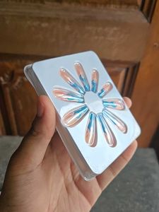Blue Flame with Nude Nail Extensions