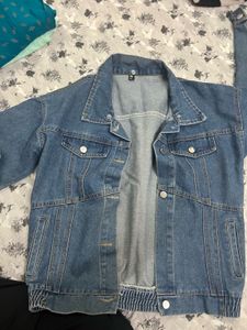Jeans Jacket With Torn Jean
