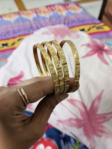4 golden bangles
