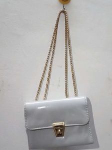 Chic Grey Crossbody Bag with Gold Chain