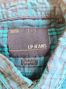 Lightly Used Shirt In Great Condition..No Defect