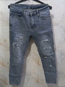 Ripped Gray Wash Jeans
