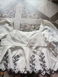 Embroidered Peplum Top