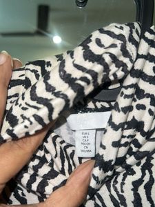 Zebra Print Turtleneck Top