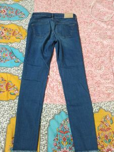 Distressed Denim Jeans