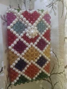 Multicoloured pearls bag