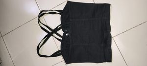 black crop top with cross straps