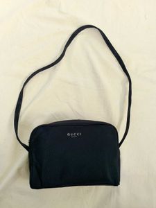 Gucci sling (perfume bag)