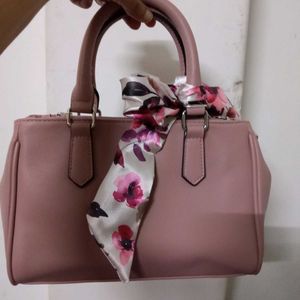 Chic Pink Handbag with Floral Scarf