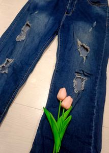 Ripped Flared Leg Jeans