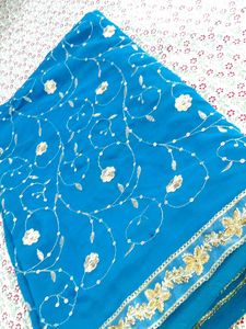 ✨ Teal Blue Saree with Golden Floral Elegance ✨