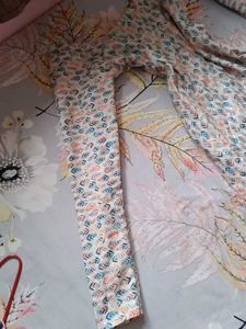 A Stitched Suit With Square Neck