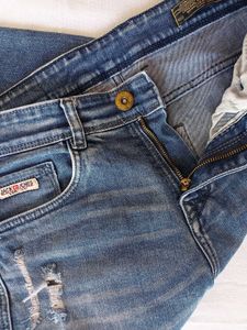 Distressed Blue Wash Denim Jeans