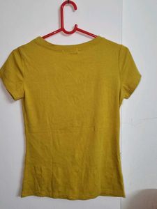 Mustard T-shirt with Rings