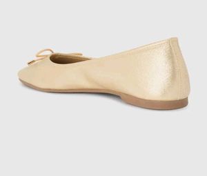 Gold Ballet Flats with Bow