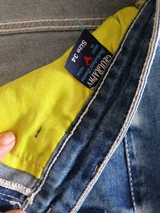 Ripped Blue Denim Jeans