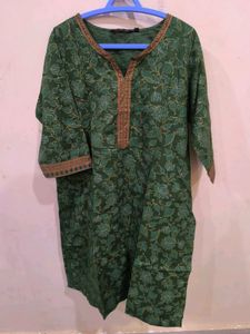 Green floral print kurti with golden detailing