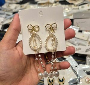 Bow N Pearls Long Korean Earrings