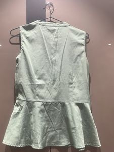 Green Sleeveless Top With Designer Neck