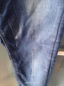 Distressed Denim Jeans