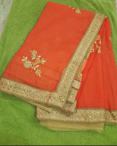 CORAL N GOLDEN NET SAREE