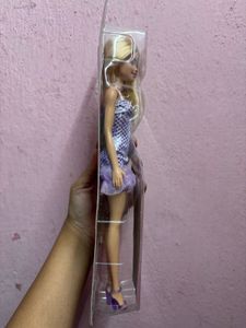 Barbie Doll in glittery purple dress