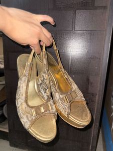 Golden Ethnic Heeled Wedges
