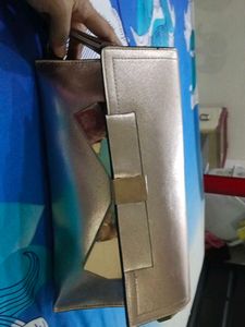 Metallic Bow Clutch