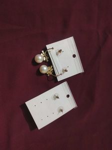 2 pair of gold plated pearl earrings with a stone