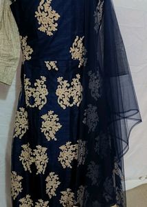 Beautiful Sober Gown With ShinyThread Work Shrug
