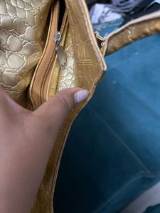 Golden party wear handbag