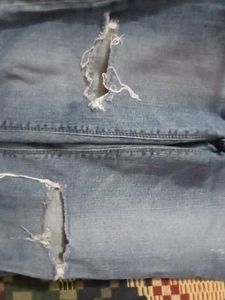 Ripped Knee Denim Jeans