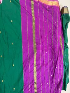 Elegant Green Saree with Gold Border