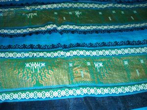 Womens Blue Cotton Saree With Golden Bady.