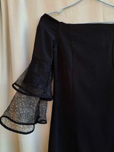 Off shoulder mini black dress